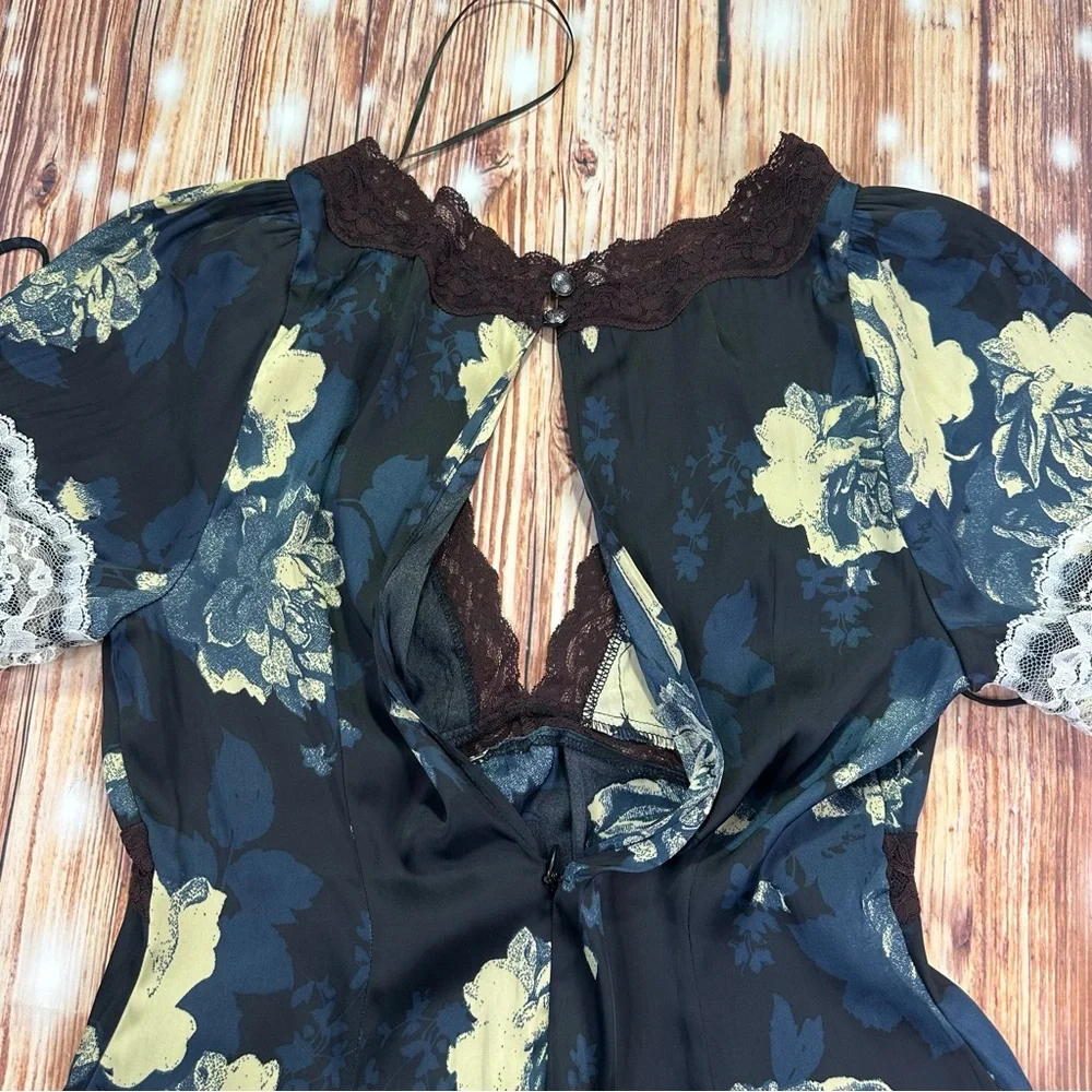 Free People Printed Mini Dress - Black Combo
Size Small - Picture 15 of 15